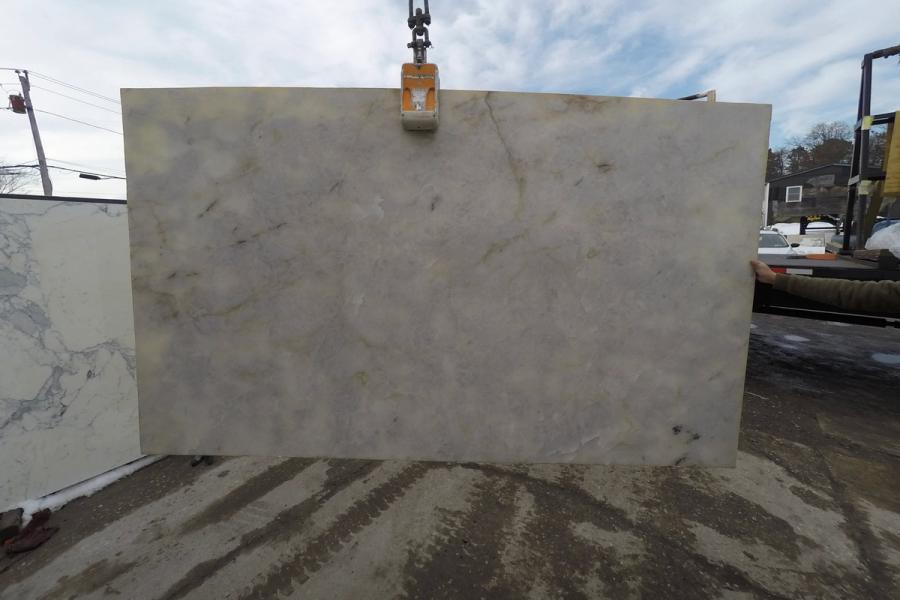 Quartzite slab — stone photographed in the yard, 120 by 60 inches