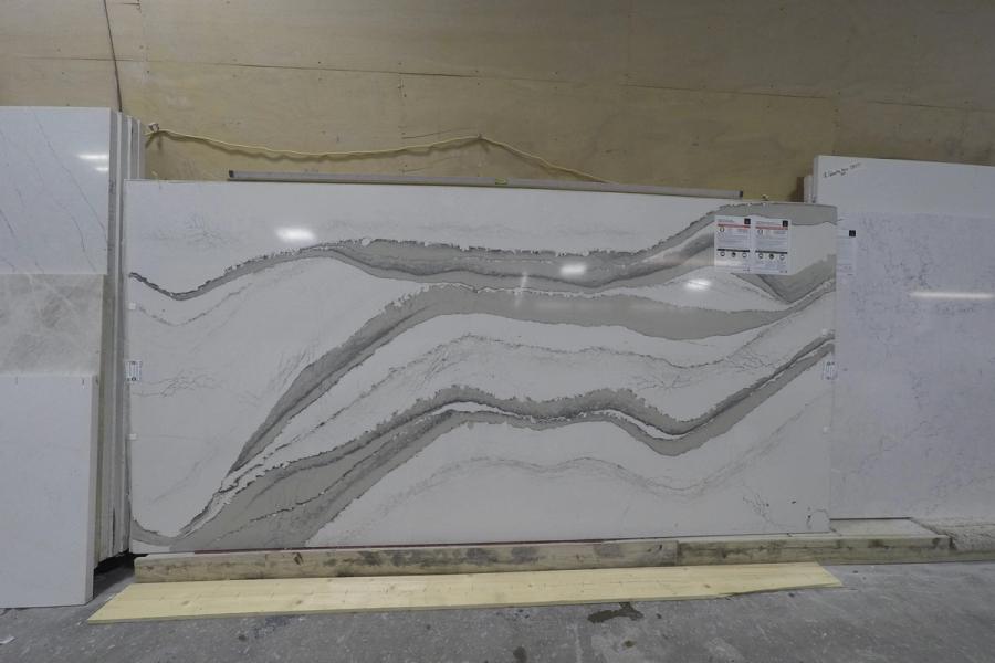 Quartz slab — stone photographed in the yard, 120 by 60 inches