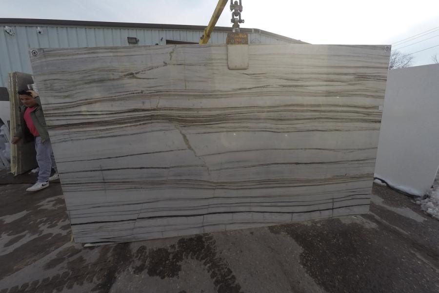 Marble slab — stone photographed in the yard, 120 by 60 inches