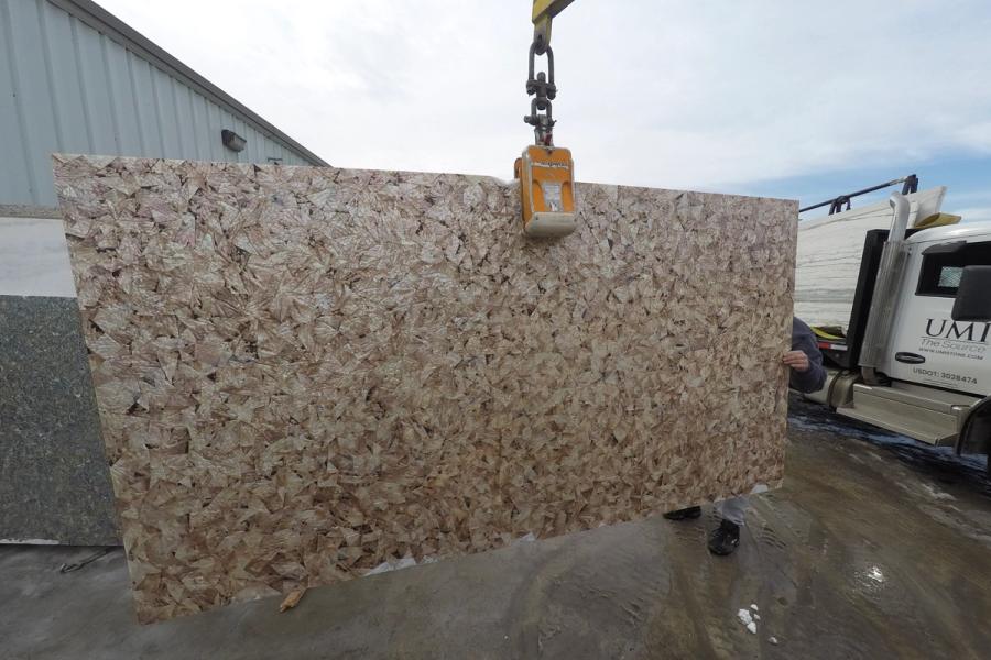 Natural stone slab — stone photographed in the yard, 120 by 60 inches