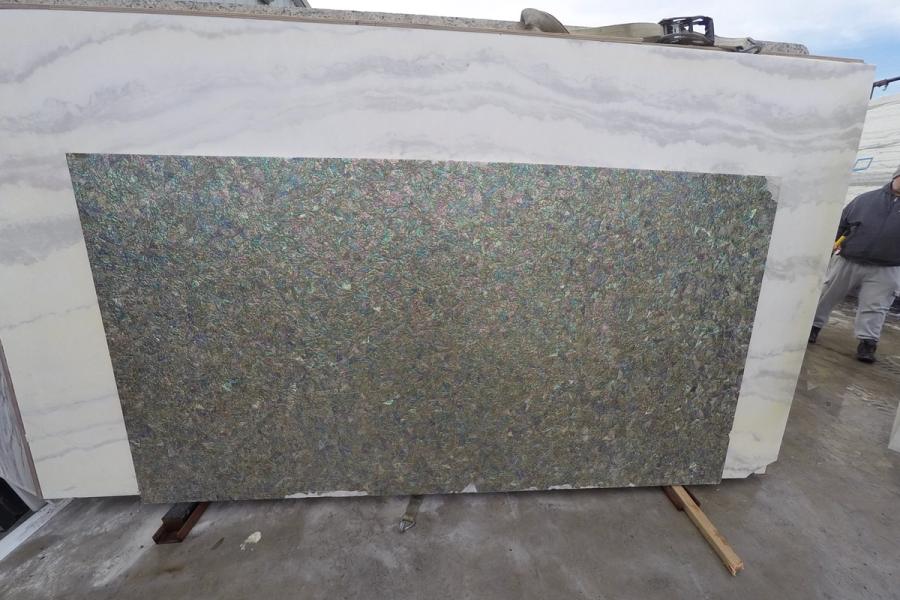 Natural stone slab — stone photographed in the yard, 120 by 60 inches
