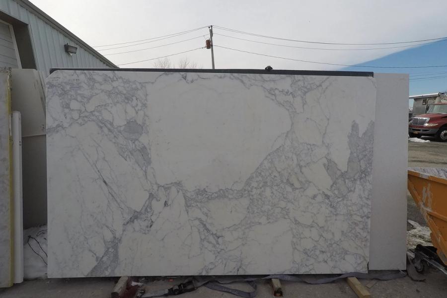 Marble slab — stone photographed in the yard, 120 by 60 inches