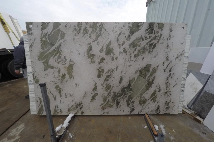 Marble slab — stone photographed in the yard, 120 by 60 inches